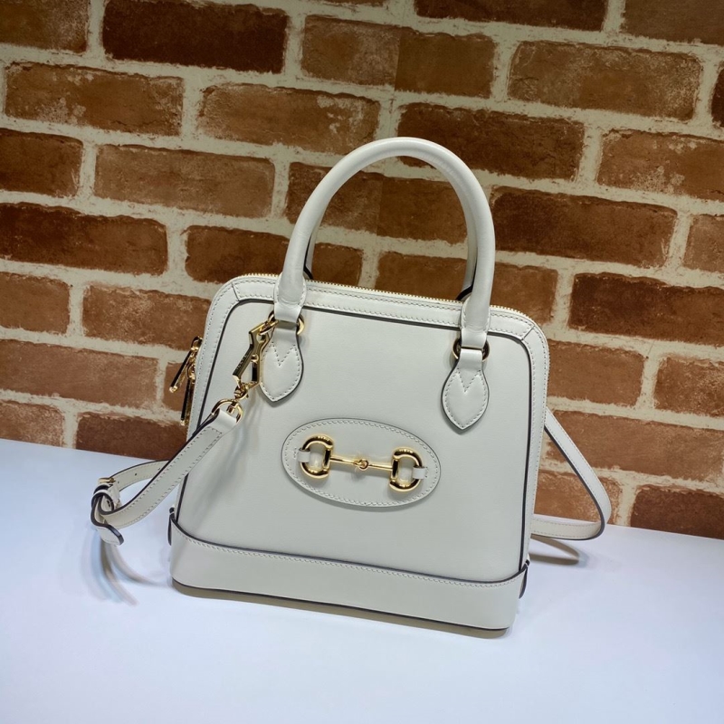 G*u*i top handle bags